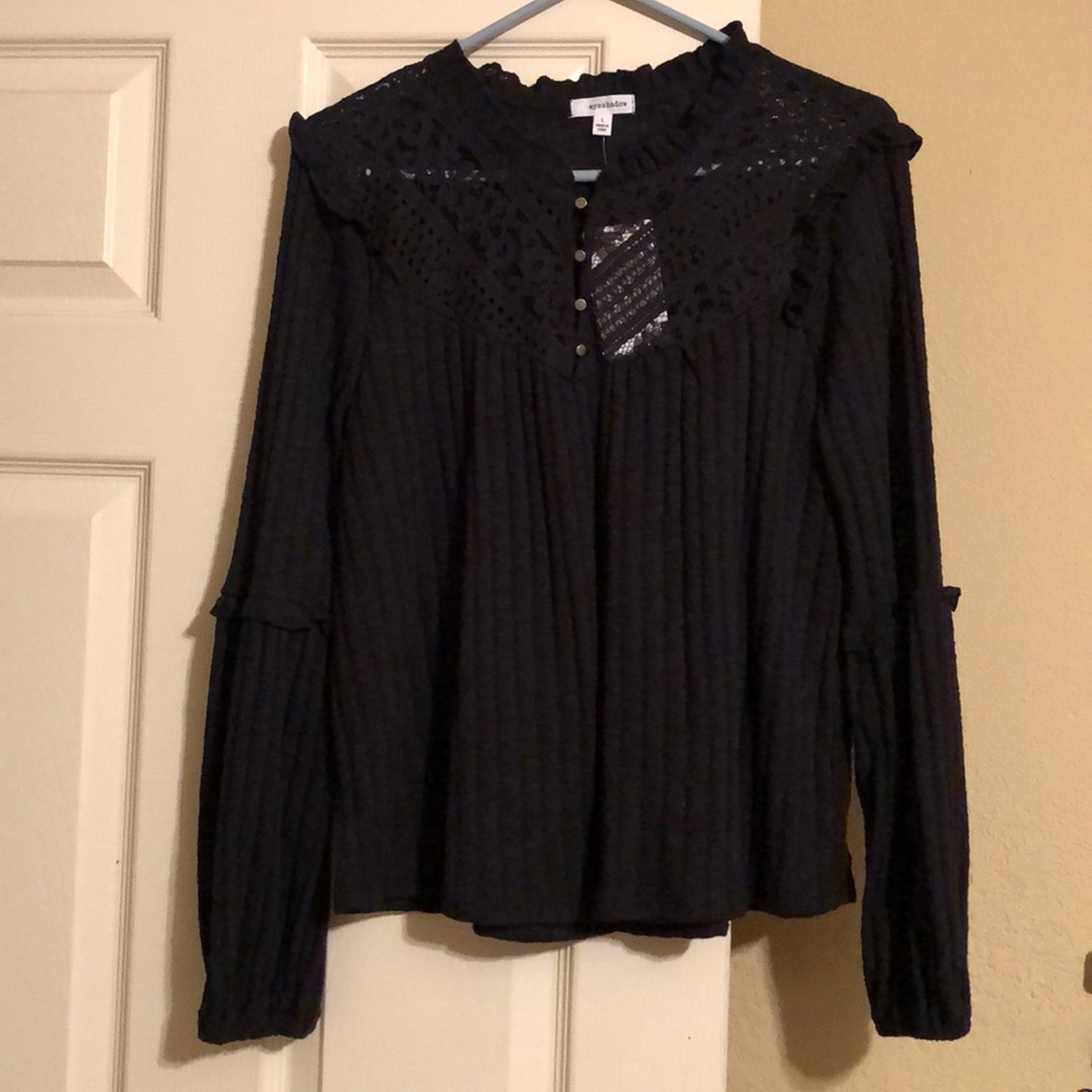 Women’s black blouse with lace